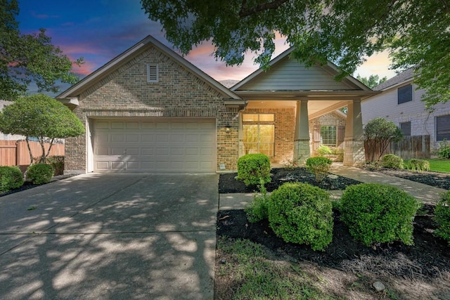 2709 Quiet Moon Trl, Cedar Park, TX 78613 - view of front of property with an attached garage, driveway, and brick siding