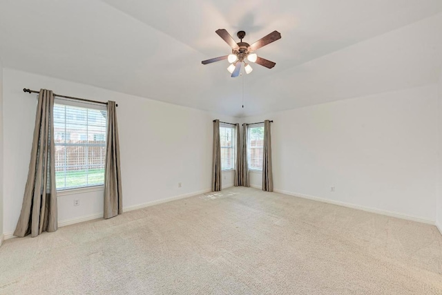 2709 Quiet Moon Trl, Cedar Park, TX 78613 - spare room featuring light colored carpet, a ceiling fan, and plenty of natural light
