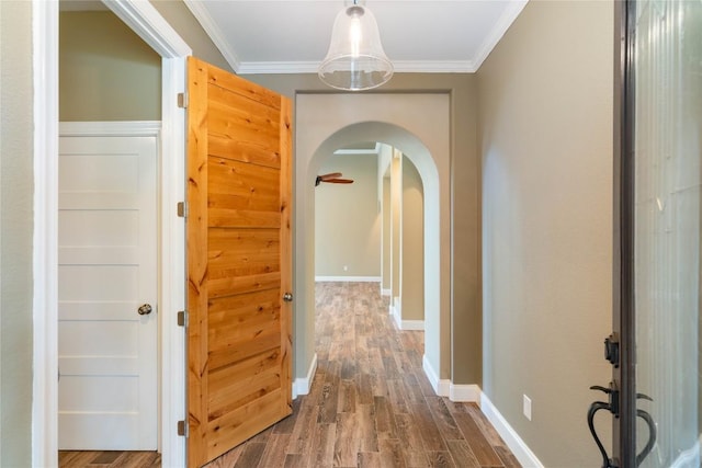 20000 Columbus Ln, Lago Vista, TX 78645 - corridor featuring arched walkways, dark wood-style flooring, and ornamental molding