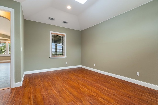 20000 Columbus Ln, Lago Vista, TX 78645 - spare room with wood finished floors and lofted ceiling
