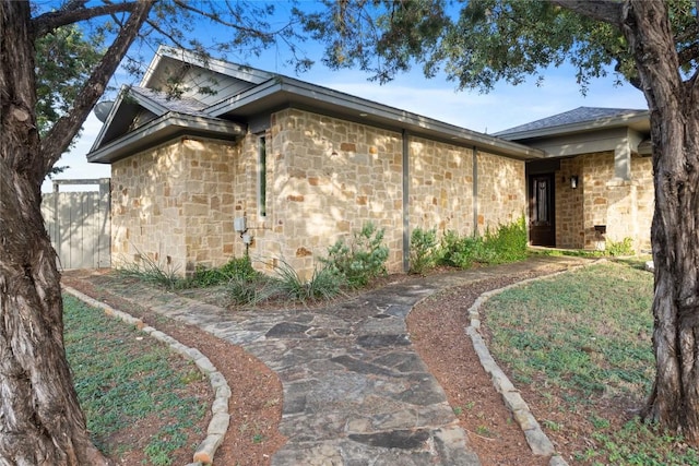20000 Columbus Ln, Lago Vista, TX 78645 - view of side of home featuring stone siding