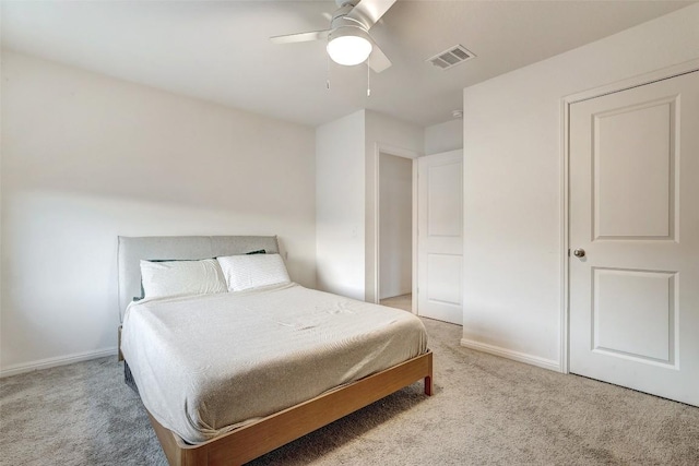 14209 Jeannette Rankin Rd, Manor, TX 78653 - carpeted bedroom with baseboards and ceiling fan