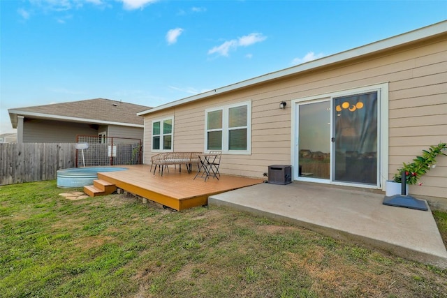 14209 Jeannette Rankin Rd, Manor, TX 78653 - rear view of property featuring a deck and a patio