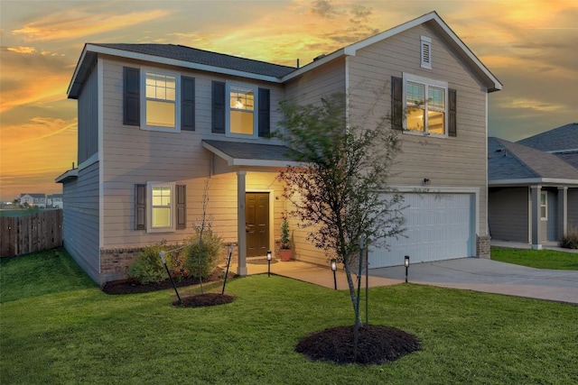 14209 Jeannette Rankin Rd, Manor, TX 78653 - traditional home featuring an attached garage and driveway