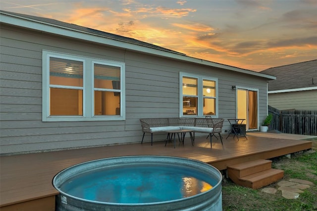 14209 Jeannette Rankin Rd, Manor, TX 78653 - rear view of house featuring a wooden deck and a jacuzzi