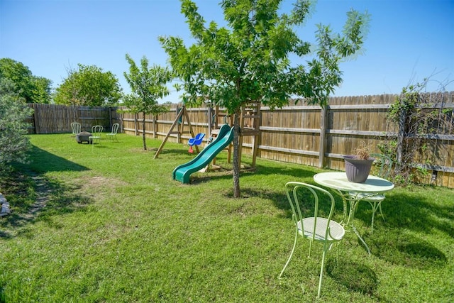115 Breakwater Dr, Bastrop, TX 78602 - view of play area with a fenced backyard