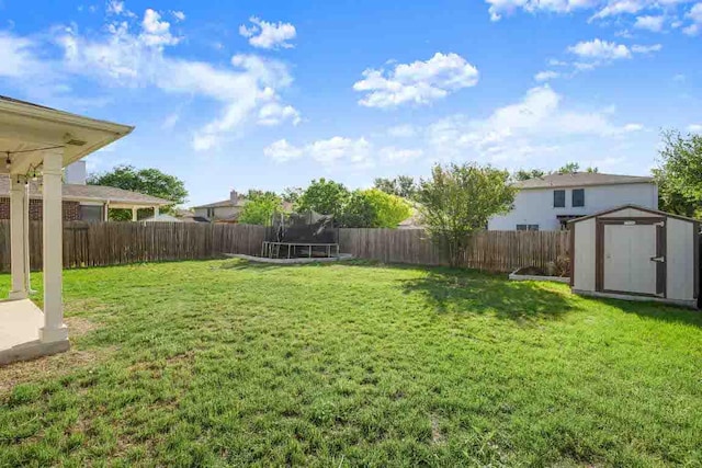 12305 Kelton Dr, Austin, TX 78754 - fenced backyard featuring a trampoline and a shed