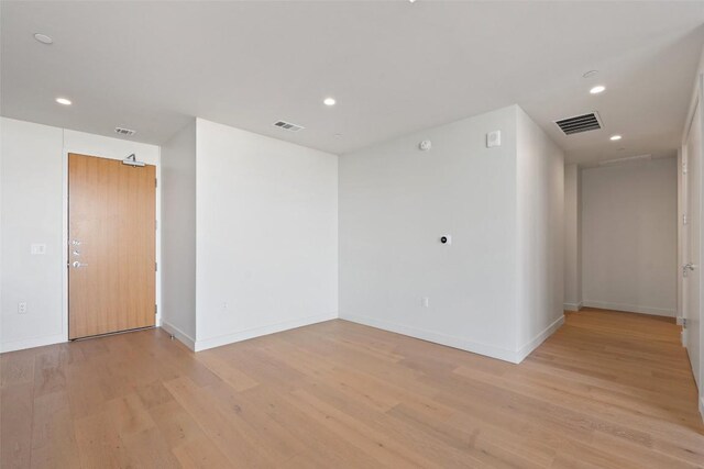 44 E Ave Unit 4302, Austin, TX 78701 - empty room featuring light wood finished floors and recessed lighting