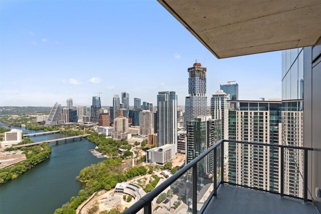 44 E Ave Unit 4302, Austin, TX 78701 - balcony featuring a water view and a view of skyline