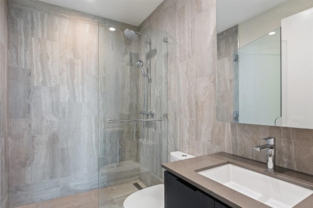 44 E Ave Unit 4302, Austin, TX 78701 - full bathroom featuring vanity, a walk in shower, tile walls, tasteful backsplash, and recessed lighting