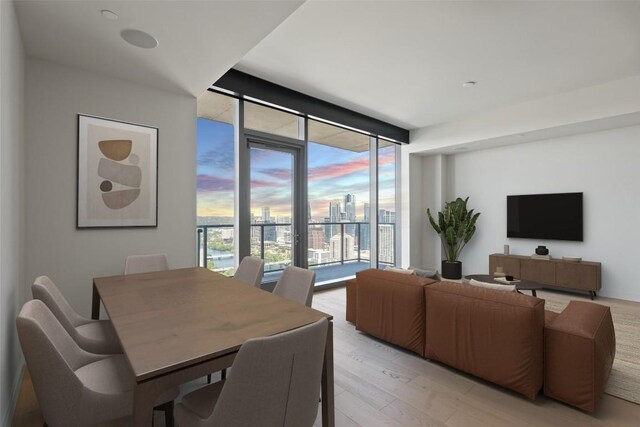 44 E Ave Unit 4302, Austin, TX 78701 - dining space featuring a wall of windows and light wood finished floors