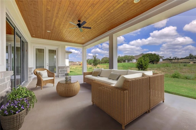 view of patio / terrace featuring french doors, a ceiling fan, and an outdoor hangout area
