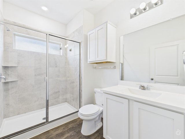 3113 Windy Vane Dr, Pflugerville, TX 78660 - full bath featuring toilet, a shower stall, vanity, and wood finished floors