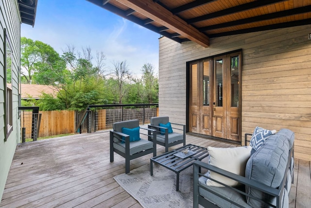 5607 Jim Hogg Ave, Austin, TX 78756 - wooden deck featuring french doors, an outdoor hangout area, and fence