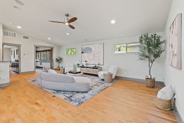 5607 Jim Hogg Ave, Austin, TX 78756 - living area with a ceiling fan, wood finished floors, lofted ceiling, recessed lighting, and baseboards