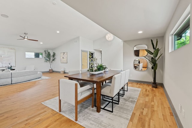 5607 Jim Hogg Ave, Austin, TX 78756 - dining area featuring baseboards, light wood-style floors, vaulted ceiling, a ceiling fan, and recessed lighting