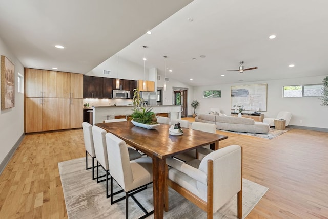 5607 Jim Hogg Ave, Austin, TX 78756 - dining area with light wood finished floors, recessed lighting, a ceiling fan, lofted ceiling, and baseboards