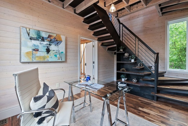 5607 Jim Hogg Ave, Austin, TX 78756 - office area featuring wood walls, plenty of natural light, and wood finished floors