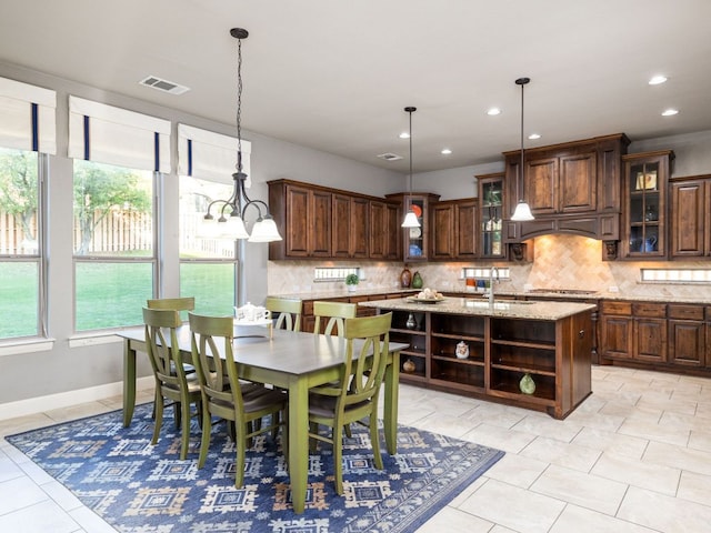 17012 Rush Pea Cir, Austin, TX 78738 - dining space with healthy amount of natural light, recessed lighting, baseboards, and light tile patterned floors