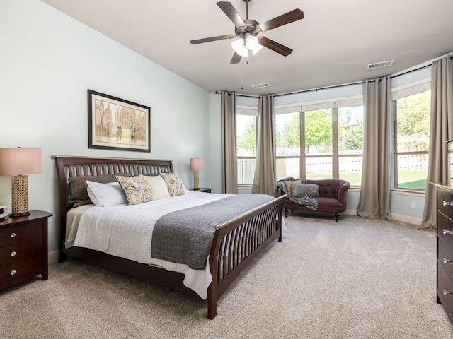 17012 Rush Pea Cir, Austin, TX 78738 - bedroom with light carpet, baseboards, and a ceiling fan