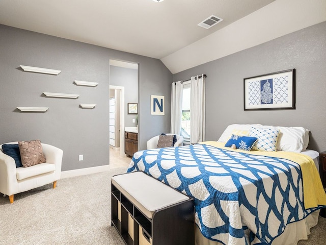 17012 Rush Pea Cir, Austin, TX 78738 - bedroom featuring lofted ceiling, light carpet, baseboards, and ensuite bathroom