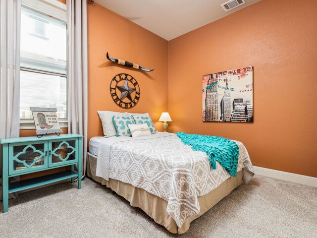 17012 Rush Pea Cir, Austin, TX 78738 - carpeted bedroom featuring baseboards