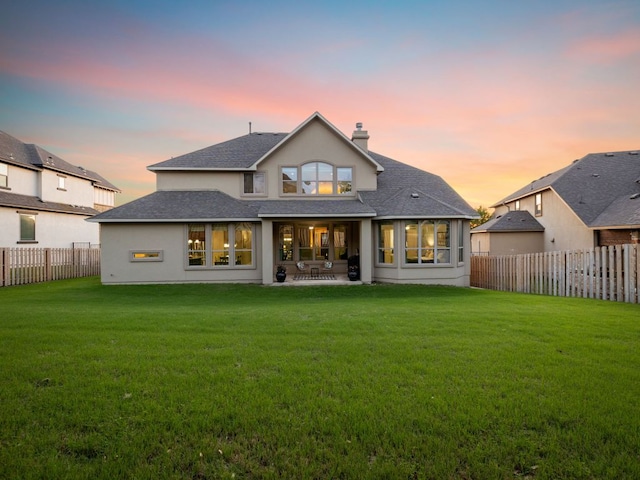 17012 Rush Pea Cir, Austin, TX 78738 - back of property featuring a chimney, a patio area, and a shingled roof