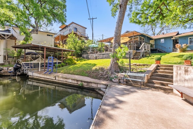 1707 Aztec Trl, Kingsland, TX 78639 - dock featuring stairs, a yard, and a deck with water view