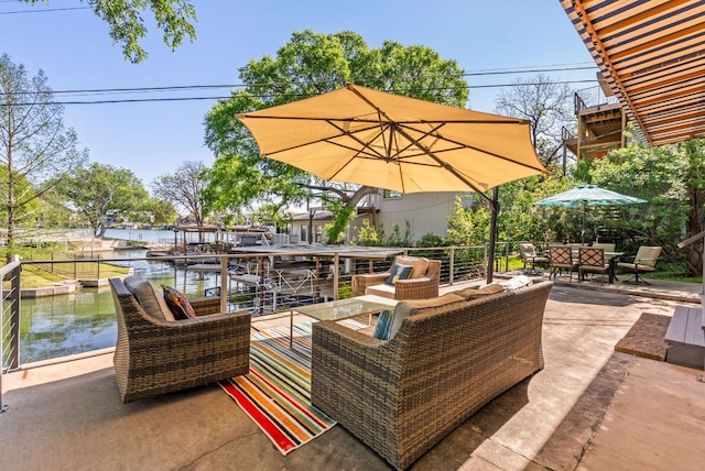 1707 Aztec Trl, Kingsland, TX 78639 - view of patio / terrace with an outdoor hangout area and a water view