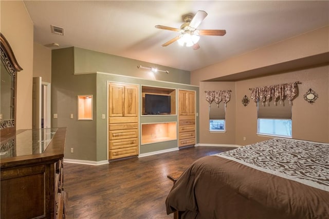 bedroom featuring ceiling fan, dark wood-style flooring, baseboards, and visible vents