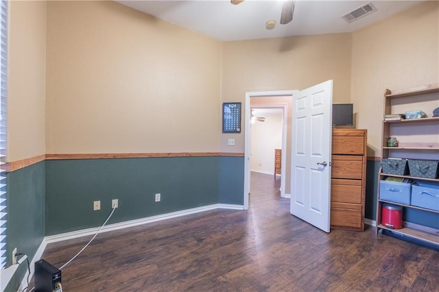 159 Klbj Rd, Smithville, TX 78957 - unfurnished bedroom featuring wood finished floors and a ceiling fan
