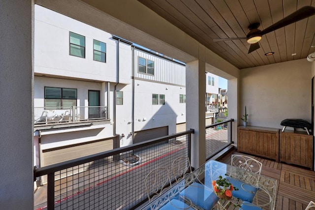 balcony featuring ceiling fan