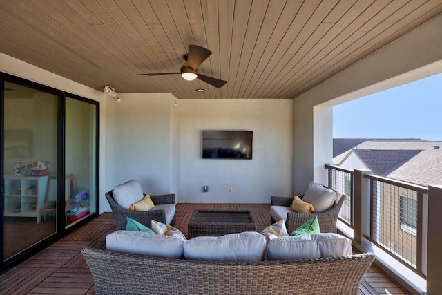 view of patio featuring outdoor lounge area, a balcony, and ceiling fan