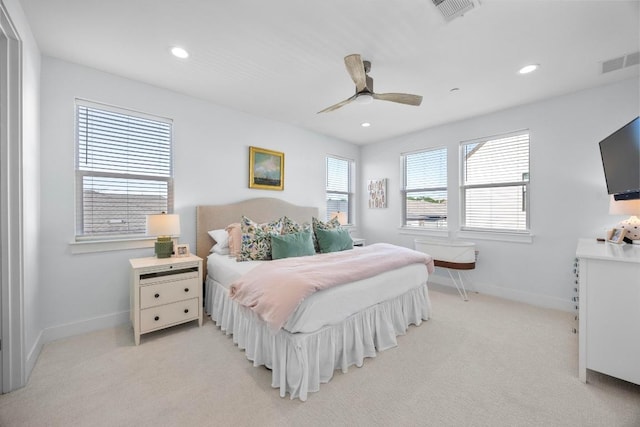 bedroom featuring light carpet, baseboards, visible vents, and recessed lighting
