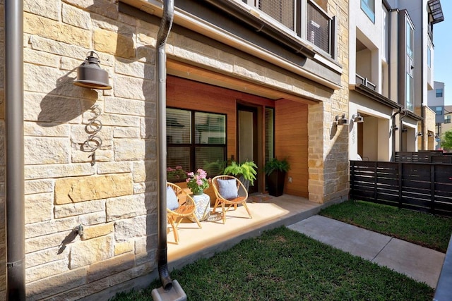 exterior space with stone siding