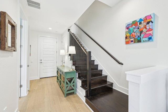 3901 Vantage Dr, Austin, TX 78731 - stairs with wood finished floors, recessed lighting, and baseboards