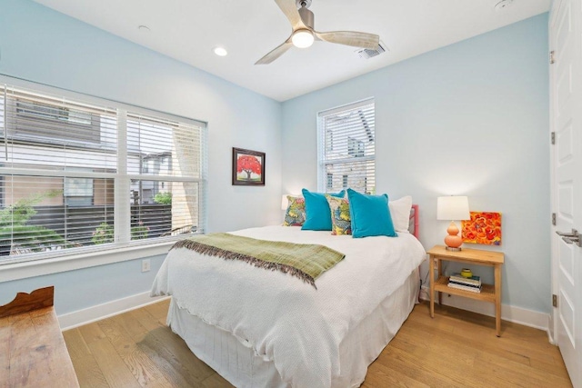 3901 Vantage Dr, Austin, TX 78731 - bedroom featuring light wood finished floors, baseboards, a ceiling fan, and recessed lighting