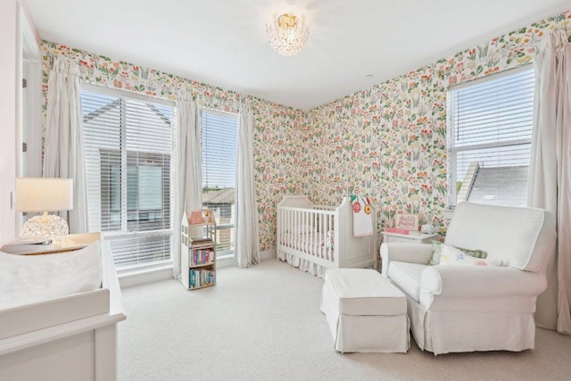 3901 Vantage Dr, Austin, TX 78731 - carpeted bedroom featuring wallpapered walls and multiple windows