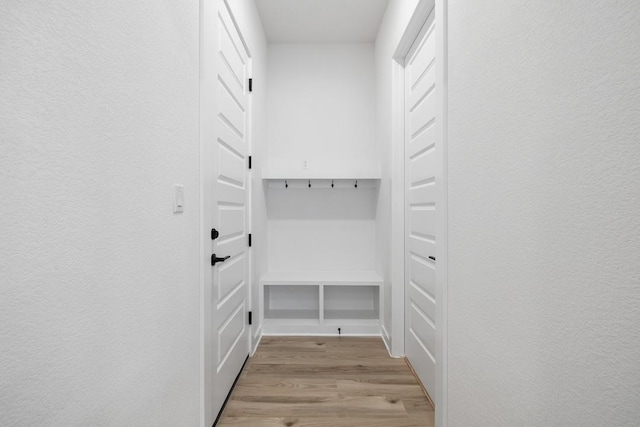mudroom featuring light wood-style floors
