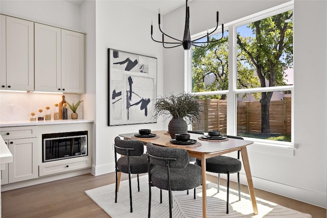 1181 Leona St, Austin, TX 78702 - dining space featuring wood finished floors and baseboards
