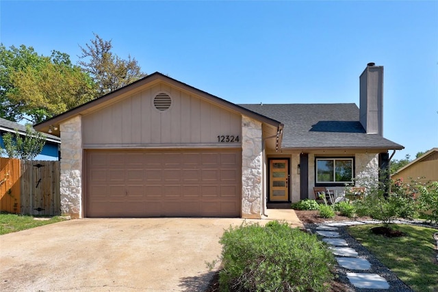 12324 Havelock Dr, Austin, TX 78759 - view of front of property featuring stone siding, a chimney, an attached garage, concrete driveway, and a shingled roof