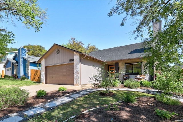 12324 Havelock Dr, Austin, TX 78759 - ranch-style home featuring an attached garage, stone siding, driveway, and roof with shingles