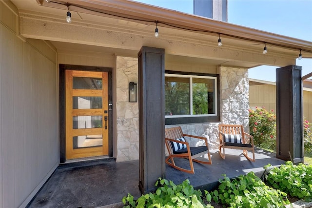 12324 Havelock Dr, Austin, TX 78759 - entrance to property featuring stone siding