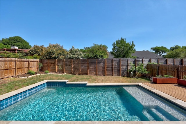 12324 Havelock Dr, Austin, TX 78759 - view of swimming pool with a fenced backyard and a wooden deck