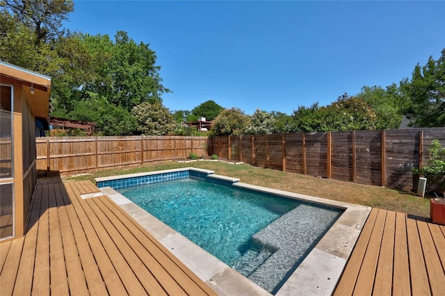 12324 Havelock Dr, Austin, TX 78759 - view of swimming pool featuring a deck and a fenced backyard