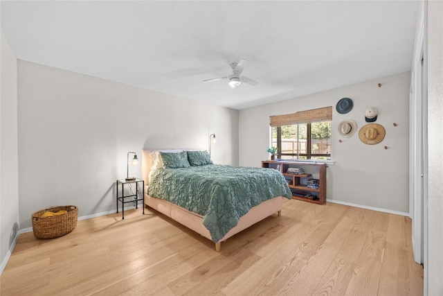 12324 Havelock Dr, Austin, TX 78759 - bedroom with wood finished floors and a ceiling fan