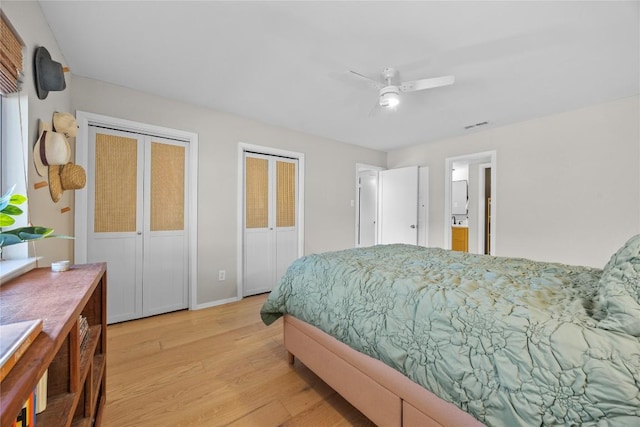 12324 Havelock Dr, Austin, TX 78759 - bedroom featuring light wood-style floors and multiple closets