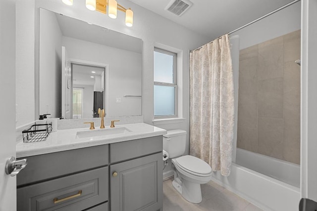 409 Dycus Bnd, Liberty Hill, TX 78642 - full bathroom featuring toilet, vanity, tile patterned floors, and shower / bath combo with shower curtain