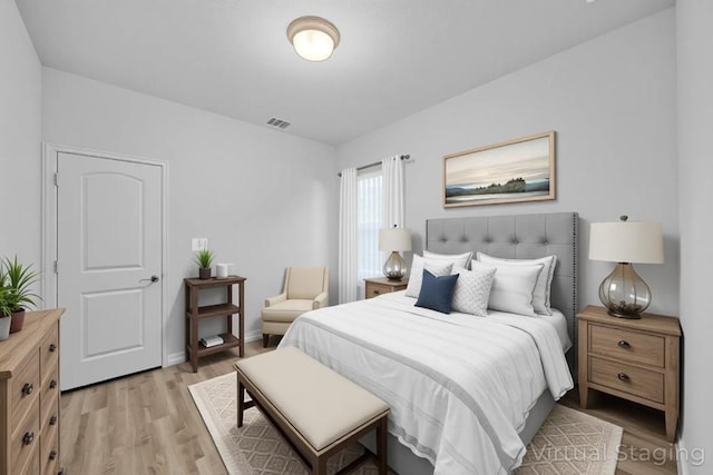 409 Dycus Bnd, Liberty Hill, TX 78642 - bedroom featuring light wood finished floors