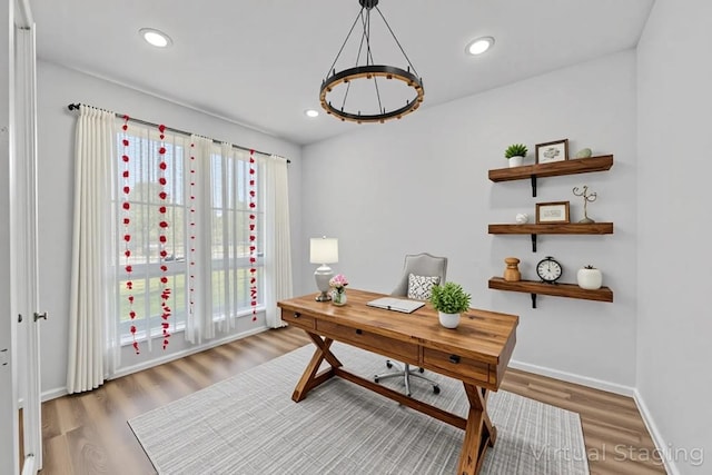 409 Dycus Bnd, Liberty Hill, TX 78642 - office space featuring wood finished floors, baseboards, and recessed lighting